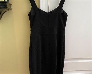 Lot 9138. $55.00   Diane Von Furstenburg Little Black Dress, Sz. 12 -Hem was taken up (39" from top of shoulder strap to bottom), and it's been pinned so needs to be tacked down (about a third of the hem should just be rehemmed.  (Even I can do that and I get the cold sweats going into a Joann Fabric Store, LOL. ) The fabric on this dress is amazing - Breast measures 17" across (x2), and length 39"., hips about 39" x2.  