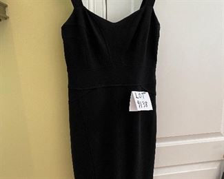 Lot 9138. $55.00   Diane Von Furstenburg Little Black Dress, Sz. 12 -Hem was taken up (39" from top of shoulder strap to bottom), and it's been pinned so needs to be tacked down (about a third of the hem should just be rehemmed.  (Even I can do that and I get the cold sweats going into a Joann Fabric Store, LOL. ) The fabric on this dress is amazing - Breast measures 17" across (x2), and length 39"., hips about 39" x2.  