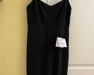 Lot 9138. $55.00   Diane Von Furstenburg Little Black Dress, Sz. 12 -Hem was taken up (39" from top of shoulder strap to bottom), and it's been pinned so needs to be tacked down (about a third of the hem should just be rehemmed.  (Even I can do that and I get the cold sweats going into a Joann Fabric Store, LOL. ) The fabric on this dress is amazing - Breast measures 17" across (x2), and length 39"., hips about 39" x2.  
