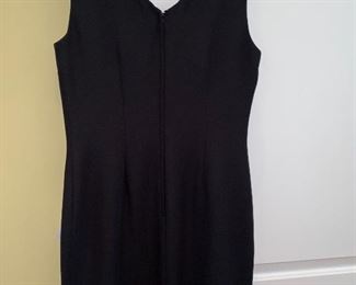 Lot 9136 $18.00.  Need a Little Black Dress?  Here's the Perfect Sleeveless one from Ann Taylor, Size Medium - Size 8,  Polyester Lining, 100% acetate, zips up the back, and it's just the right garment for a business cocktail party, a wedding, or even a funeral.  Everyone should own one of these - this is in excellent condition and reasonably priced!.