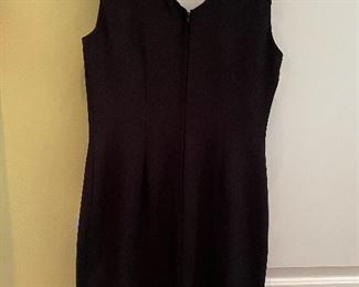 Lot 9136 $18.00.  Need a Little Black Dress?  Here's the Perfect Sleeveless one from Ann Taylor, Size Medium - Size 8,  Polyester Lining, 100% acetate, just the right garment for a business cocktail party, a wedding, or even a funeral.  Everyone should own one of these - this is in excellent condition and reasonably priced!.