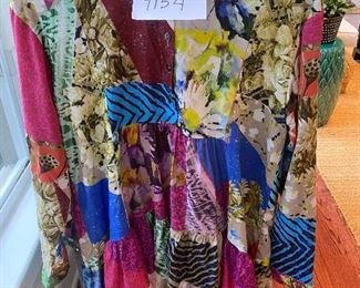 Lot 9154. $32.00. Colorful top by "Conditions Apply" Size Medium, Owner thinks she got this at Anthropologie, Front Measures 27.5" long and rear is longer, at 32.5".  Top is gathered under bust, and swings out in a swing fashion., Long sleeve with buttons at wrist.  So adorable!