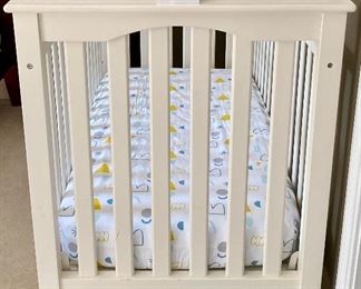 Lot 9164.  $200.00 Pottery Barn, "Kendall low profile Crib", with Serta mattress.  Fixed sides, Great looking crib as well, good for baby girls or boys.