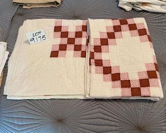 Lot 9175.  $65.00 Vintage rose colored, solid and floral print, hand stitched quilt.	90" L x 80" W