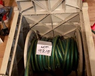 Lot 9215.  $30.00 Suncast hose reel in tan with 50' hose.	20" square