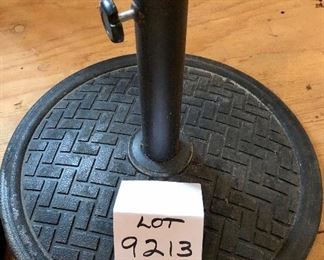 Lot 9213. $120.00/Pr.   2 very nice iron umbrella bases for outdoor patio umbrellas.  18" Diameter  Base.