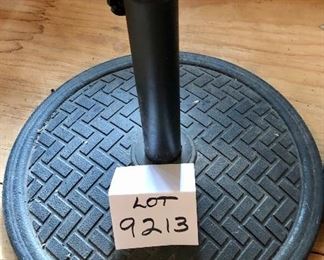 Lot 9213. $120.00/Pr.   2 very nice iron umbrella bases for outdoor patio umbrellas.  18" Diameter  Base.