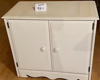 Lot 9211. $55.00 Vintage White, double door wood cabinet with 2 interior shelves.  Great storage or bookcase for kids room.	32" W x 17.5" D x 29"T