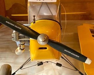 Lot 9214. $150.00  Piper Cub Radio Control Airplane, in a vibrant yellow color.  All decals in place and in good condition, all parts are with this plane. NC54271.  No Remote control	48" L x 77" W wingspan