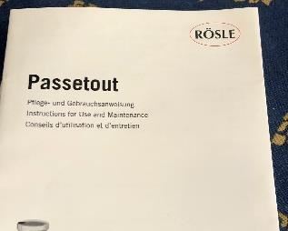 Lot 9219. $50.00.  Another cooking lot, a Rosle Passetout stainless steel food mill and a Fire King clear glass loaf pan with handles.