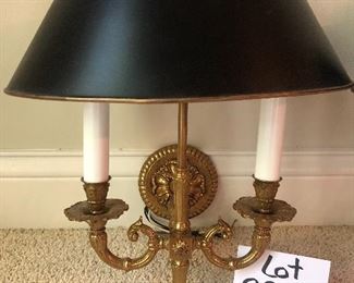 Lot 9226.  $400.00. Two brass Bouillotte wall sconce/lights with black metal oval shades.  They measure 17" Tx14" W x 9"D and were made in Spain.