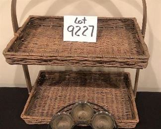 Lot 9227.  $50.00.  Patio table candle set that circles the umbrella pot and a 2 tiered handled basket. (15" W x 10"D x 20).  
