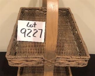 Lot 9227.  $50.00.  Patio table candle set that circles the umbrella pot and a 2 tiered handled basket. (15" W x 10"D x 20).  