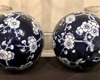 Lot 9230.  $55.00.  Apothecary jar (19.5"H x 6"W), 2 glass pots (5"H x 4"W), and 2 cobalt and white floral spheres (4.5" diam).