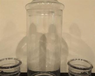 Lot 9230.  $55.00.  Apothecary jar (19.5"H x 6"W), 2 glass pots (5"H x 4"W), and 2 cobalt and white floral spheres (4.5" diam).