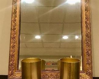 Lot 9232.  $60.00.  Pottery Barn candles in a brass holder (4.5"H x 3"W) and a gold bevelled mirror (15"H x 21W).