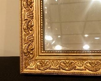 Lot 9232.  $60.00.  Pottery Barn candles in a brass holder (4.5"H x 3"W) and a gold bevelled mirror (15"H x 21W).