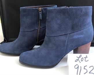 Lot 9152. $45.00. Cole Haan just terrific Ankle Boots with Nike Air Cushioning, in Blue Leather with zipper on the inside of the boot.  These booots do not look worn and considering Cole Haan and Nike parted ways a way back, this is like buying a brand new pair of boots with the best of both the Cole Haan and Nike worlds.  These boots are make for walking....comfortably.  Look great with jeans.