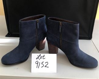 Lot 9152. $45.00. Cole Haan just terrific Ankle Boots with Nike Air Cushioning, in Blue Leather with zipper on the inside of the boot.  These booots do not look worn and considering Cole Haan and Nike parted ways a way back, this is like buying a brand new pair of boots with the best of both the Cole Haan and Nike worlds.  These boots are make for walking....comfortably.  Look great with jeans.