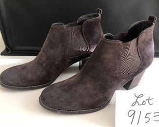Lot 9153. $50.00. Here's another pair of leather ankle boots, this time by  Paul Green (sold at Nordstrom or similar stores).  These are marked 6.5, however they are made in Austria, look barely worn on the bottom, done in a brown sueded leather with about a 2.5" heel.  They are pull-ons with a tab in the back to pull on, and a comfy elastic panel on both sides of the boot to ease your foot into comfort.  All the rest of the owner's shoes are about a size 9B so perhaps this is the Euro equivalent.  T hey measure up to her other boots and shoes!!
