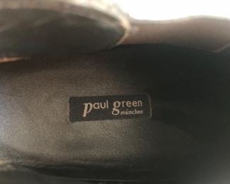 Lot 9153. $50.00. Here's another pair of leather ankle boots, this time by  Paul Green (sold at Nordstrom or similar stores).  These are marked 6.5, however they are made in Austria, look barely worn on the bottom, done in a brown sueded leather with about a 2.5" heel.  They are pull-ons with a tab in the back to pull on, and a comfy elastic panel on both sides of the boot to ease your foot into comfort.  All the rest of the owner's shoes are about a size 9B so perhaps this is the Euro equivalent.  T hey measure up to her other boots and shoes!!