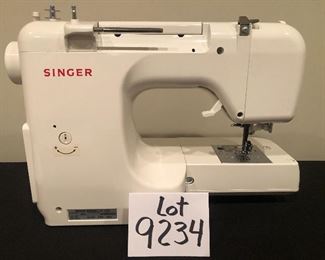 Lot 9234.  $75.00.  Singer portable sewing machine - Protege Model 2639.  In box.
