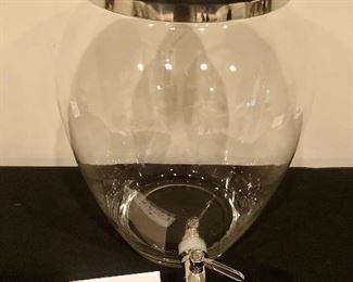 Lot 9237.  $22.00.  Clear drink dispenser with silver colored lid and spigot.  14"H x 10"W