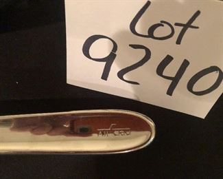 Lot 9240.   $165.00.  All Clad two-handled saute pan or perhaps a wok  (13" Dia x 3"T) with lid and All Clad slotted spoon.