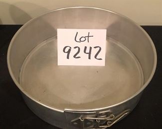 Lot 9242.  $45.00.  Pottery Barn Stainless steel ice bucket with tongs (6"H x 6"W) and a springform pan.  Why this pairing?  We have no excuse  haha!!  Editor's note:  If you can make a successful cheesecake, pour yourself a drink and use the ice bucket, lol!  We're getting punchy by now!