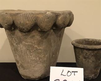 Lot 9246.  $40.00.  2 Concrete flower pots with one with seashells (9"H x 10"W) and one plain(5"H x 5"W)		$40.00	