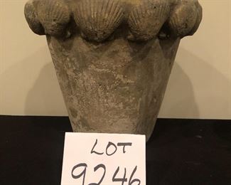Lot 9246.  $40.00.  2 Concrete flower pots with one with seashells (9"H x 10"W) and one plain(5"H x 5"W)		$40.00	