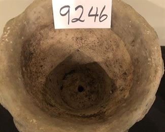 Lot 9246.  $40.00.  2 Concrete flower pots with one with seashells (9"H x 10"W) and one plain(5"H x 5"W)		$40.00	