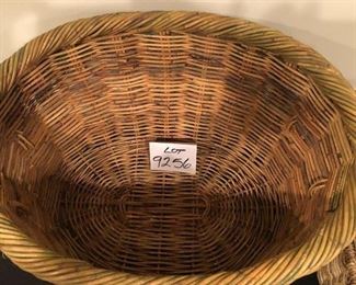 Lot 9256.  $38.00.  Two Antique or vintage baskets:  Oval basket with moss (26.5" W x 18" Deep x 13.5"H), and a rectangular rattan basket (15"L x 9.5"W x 7.5"H)