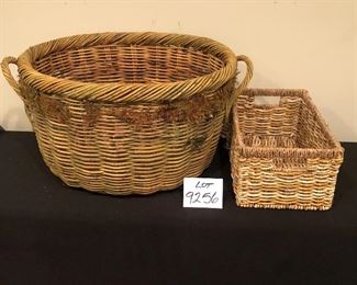 Lot 9256.  $38.00.  Two Antique or vintage baskets:  Oval basket with moss (26.5" W x 18" Deep x 13.5"H), and a rectangular rattan basket (15"L x 9.5"W x 7.5"H)