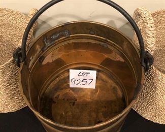 Lot 9257.  $59.00 all.  Copper bucket/planter (12.5"D x 10"T), plus 2 woven baskets with handles. (11"dia x 10" T).   Small Kindling for your fireplace would find a home in this gorgeous vintage copper bucket, by the way!