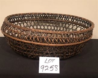 Lot 9258.   $48.00.  Open weave basket (17"W x 22" L x8" H) and a rectangular basket - tray style with handles 919"W x 24" L).  Unique looking weaves and stylish baskets!