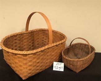 Lot 9259.  $42.00.  Handled basket (16"L x 9.5" W x 6"H) and a handled basket (27"L x 17"W x 10"H).  A terrific picnic basket, flower or vegetable gathering basket from the garden, catch-all basket for the stairs, and a hundred other uses - plus it's very attractive!