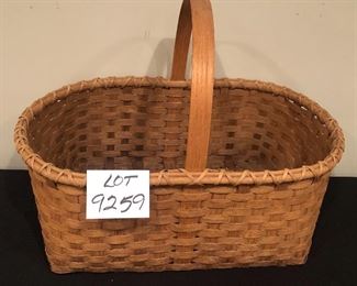 Lot 9259.  $42.00.  Handled basket (16"L x 9.5" W x 6"H) and a handled basket (27"L x 17"W x 10"H).  A terrific picnic basket, flower or vegetable gathering basket from the garden, catch-all basket for the stairs, and a hundred other uses - plus it's very attractive!