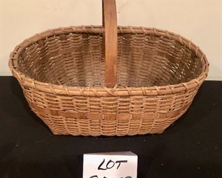 Lot 9259.  $42.00.  Handled basket (16"L x 9.5" W x 6"H) and a handled basket (27"L x 17"W x 10"H).  A terrific picnic basket, flower or vegetable gathering basket from the garden, catch-all basket for the stairs, and a hundred other uses - plus it's very attractive!