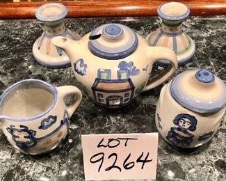 Lot 9264.  $53.00.  2 MA Hadley candlesticks, a creamer and sugar set and a teapot that has a repaired spout.  (see pictures).  Please be advised, Hadley fans, we have lots of lots of M.A. Hadley items here and would be delighted to combine the lots for further discounts.  Keep checkin' them out!