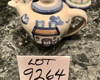   Lot 9264.  $53.00.  2 MA Hadley candlesticks, a creamer and sugar set and a teapot that has a repaired spout.  (see pictures).    Please be advised, Hadley fans, we have lots of lots of M.A. Hadley items here and would be delighted to combine the lots for further discounts.  Keep checkin' them out!