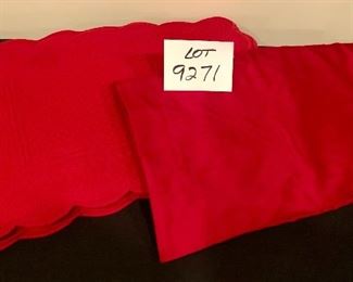 Lot 9271.  $39.00.  8 red, quilted placemats and a red, silk table runner.