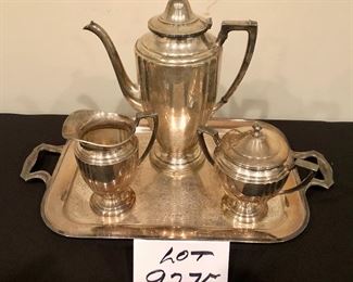 Lot 9275.  $45.00.  Perfect for holiday parties; a silverplate tray (18" W x 10.5"H) a coffee server (10" H) and a cream and sugar set.