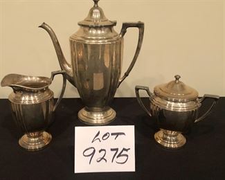 Lot 9275.  $45.00.  Perfect for holiday parties; a silverplate tray (18" W x 10.5"H) a coffee server (10" H) and a cream and sugar set.