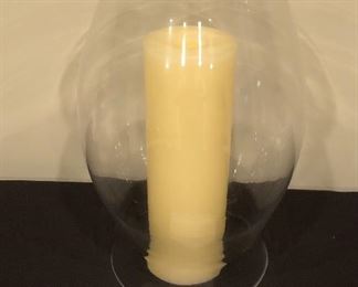 Lot 9276.  $25.00.  Hurricane lamp (17"H x 8.5"W) with an off white candle.