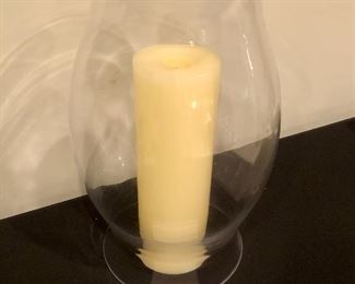 Lot 9276.  $25.00.  Hurricane lamp (17"H x 8.5"W) with an off white candle.