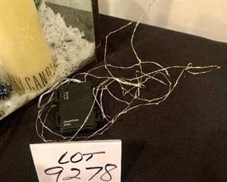 Lot 9278.  $45.00.  West Elm Hurricane lantern with Christmas trees, snow and rice lights and candle.