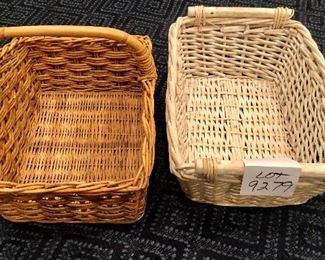 Lot 9279.  $40.00.  Wicker basket with handles (14"W x 18" L x 10" D) and a white washed wicker basket with bamboo  handles (15"W x 1" L x7 d)