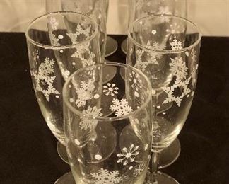Lot 9280.  $33.00.  Pottery Barn holiday glasses - 11 champagne flutes.  This pattern is so festive - pefect for a toast to a better dang 2022!
