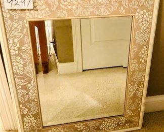 Lot 9297.  $75.00.  Beveled wall mirror with taupe and white print design border.  27" W x 32"T. Super Sharp looking mirror!